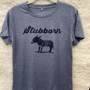 Stubborn Ass Tshirt in a nice grey. Very soft material and nwt. 😂 sizes L & XL